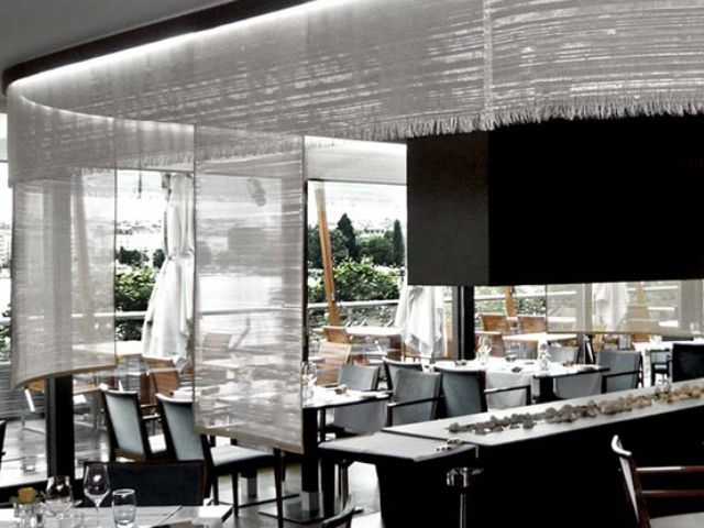 Laminated glass art mesh is used for restaurant ceiling decoration.